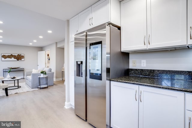 kitchen featuring light wood-style floors, recessed lighting, white cabinets, and stainless steel refrigerator with ice dispenser