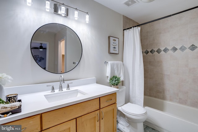 full bath with shower / tub combo, visible vents, vanity, and toilet