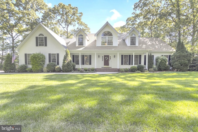 36 Love Creek Dr, Lewes, DE 19958 - cape cod-style house featuring a front lawn and roof with shingles