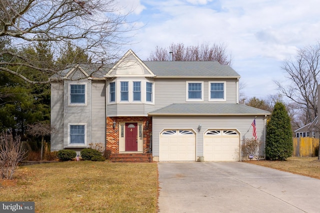 traditional-style house featuring an attached garage, brick siding, driveway, and a front lawn