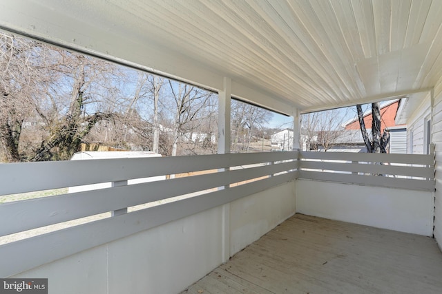 unfurnished sunroom featuring wooden ceiling