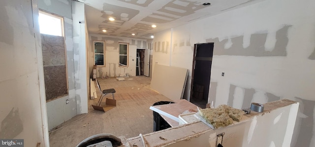 interior space with coffered ceiling