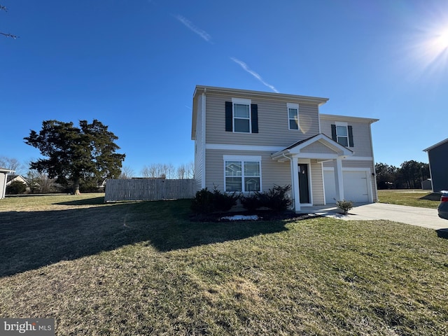 traditional home with driveway, an attached garage, fence, and a front yard