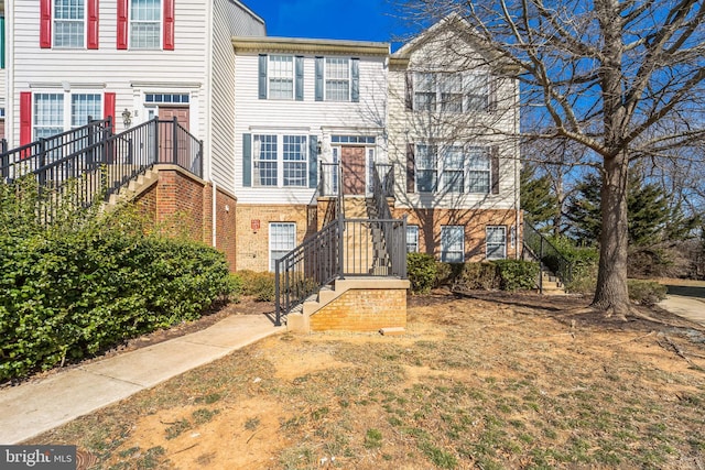 multi unit property featuring brick siding