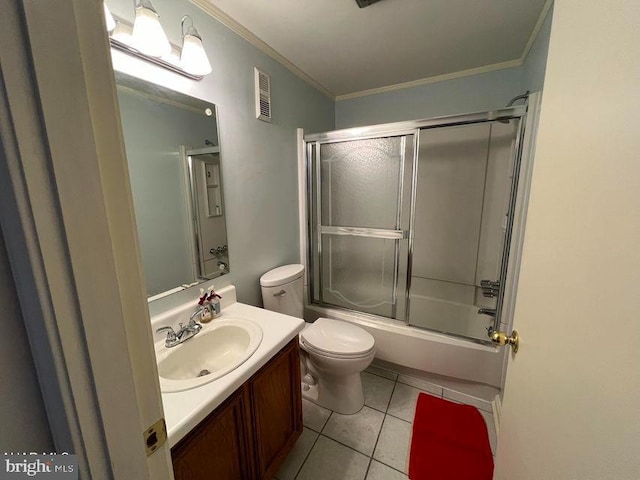 bathroom with visible vents, toilet, ornamental molding, vanity, and tile patterned floors