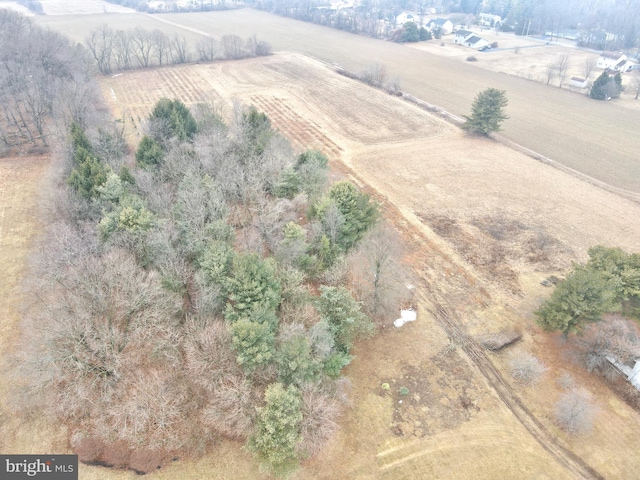 birds eye view of property featuring a rural view