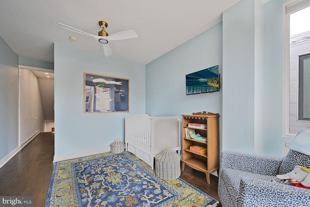 bedroom featuring a ceiling fan and wood finished floors