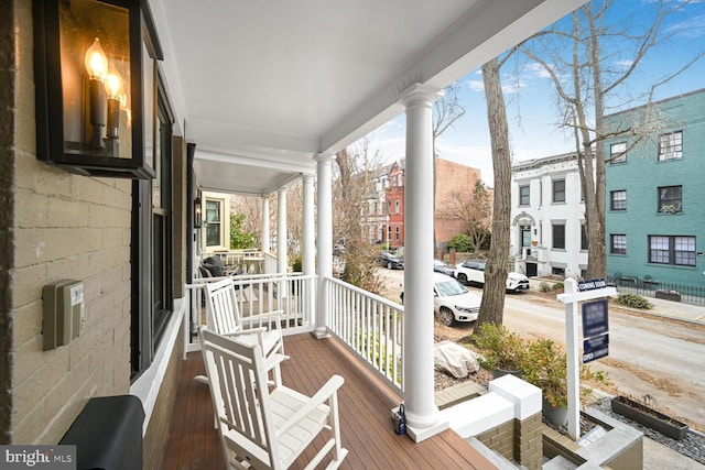 balcony featuring a porch