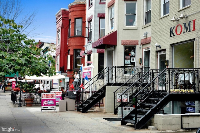 view of property with stairway