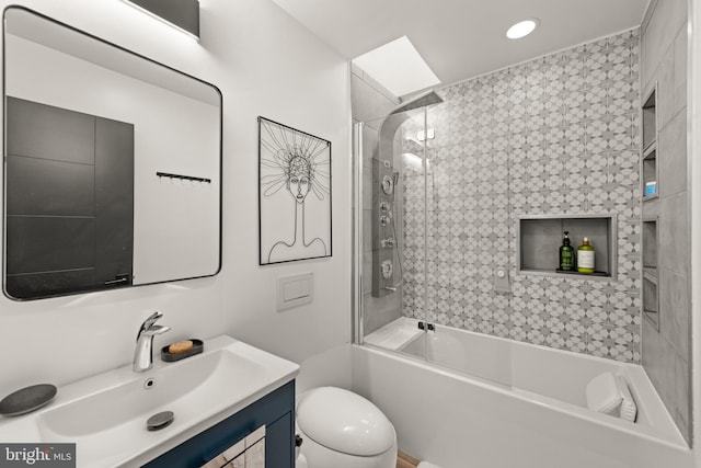 bathroom featuring toilet, recessed lighting, washtub / shower combination, and vanity