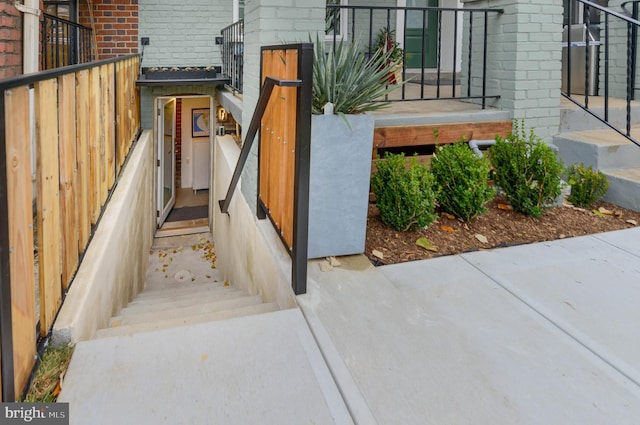 entrance to property with brick siding