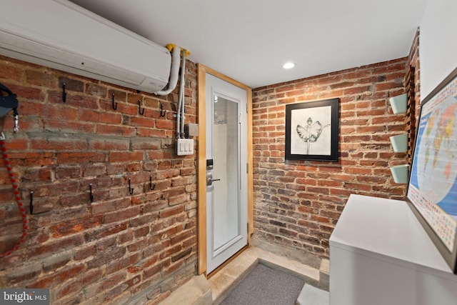 doorway to property featuring a wall mounted air conditioner