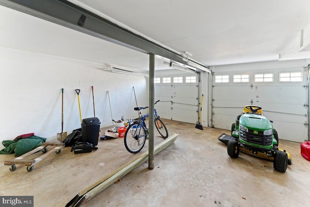 garage featuring concrete block wall