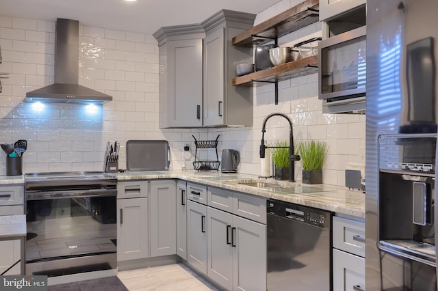 kitchen with dishwasher, wall chimney exhaust hood, stainless steel microwave, black electric range oven, and gray cabinets