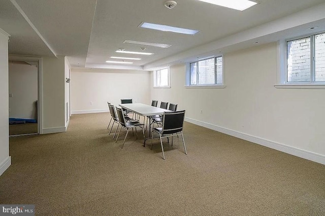 dining area with carpet flooring and baseboards