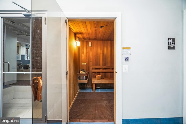 view of sauna with tile patterned flooring