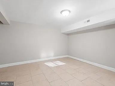 interior space featuring visible vents and baseboards