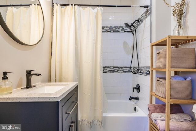 full bath with shower / tub combo with curtain and vanity