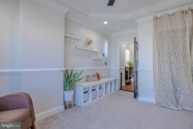 living area featuring carpet, recessed lighting, ornamental molding, a ceiling fan, and baseboards