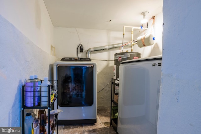 utility room featuring washer and dryer