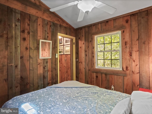 47 Timberline Dr, Lost River, WV 26810 - bedroom with vaulted ceiling, wooden walls, and a ceiling fan