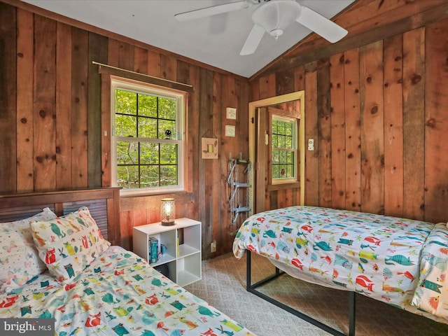 47 Timberline Dr, Lost River, WV 26810 - bedroom with wooden walls, vaulted ceiling, and ceiling fan