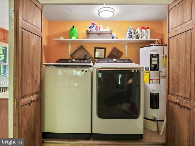 47 Timberline Dr, Lost River, WV 26810 - washroom featuring washing machine and dryer, water heater, and cabinet space