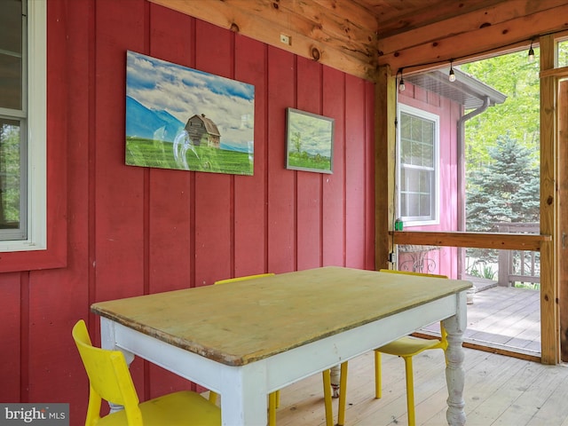 47 Timberline Dr, Lost River, WV 26810 - dining area featuring plenty of natural light, hardwood / wood-style floors, and wood walls