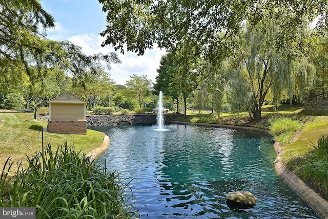 exterior space with a water view