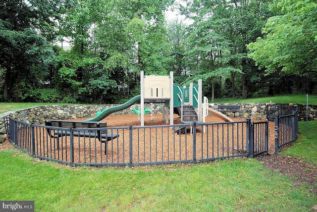 community play area featuring a yard