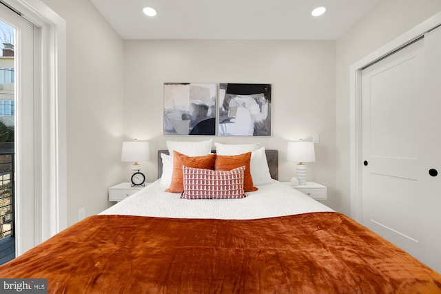 bedroom featuring access to outside and recessed lighting