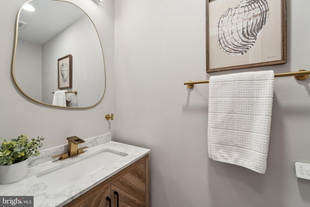 bathroom featuring visible vents and vanity