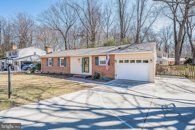 ranch-style house featuring an attached garage, driveway, fence, and brick siding