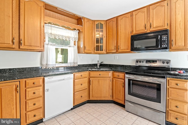 kitchen with stainless steel electric stove, white dishwasher, a sink, dark stone counters, and black microwave