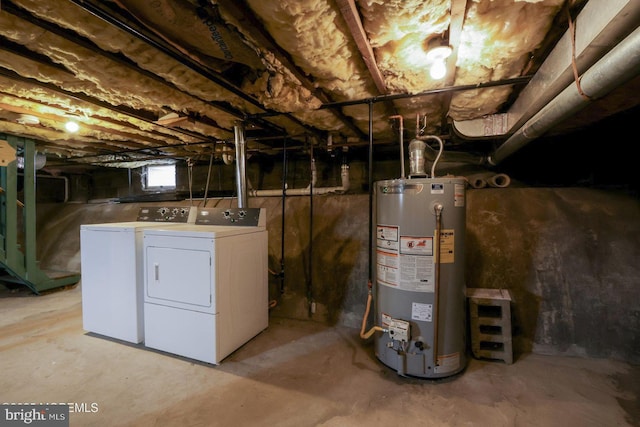 basement with gas water heater and independent washer and dryer