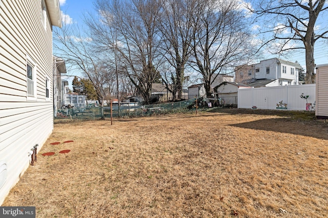 view of yard featuring a fenced backyard