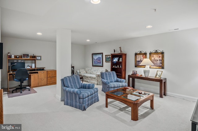 living area featuring light carpet, visible vents, and recessed lighting