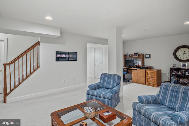 living room featuring light carpet, stairs, baseboards, and recessed lighting