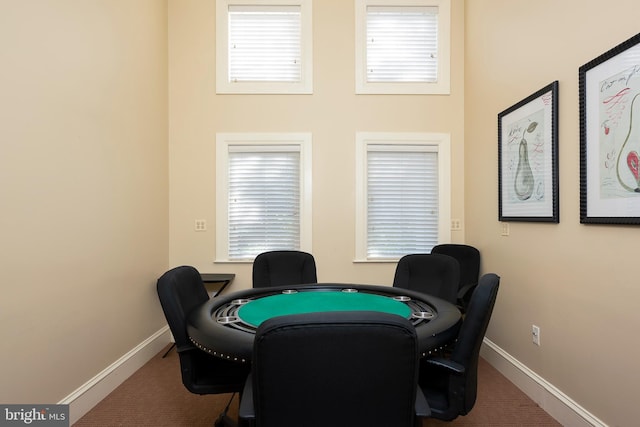 game room with carpet, a wealth of natural light, and baseboards