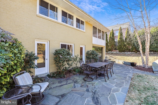 view of patio featuring outdoor dining space