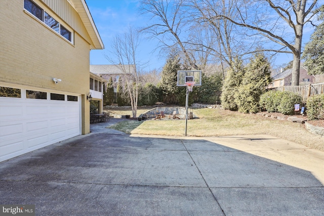 view of patio with concrete driveway