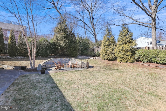 view of yard featuring a patio area and fence