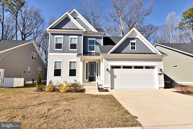 view of front of property with a garage, a standing seam roof, board and batten siding, and concrete driveway