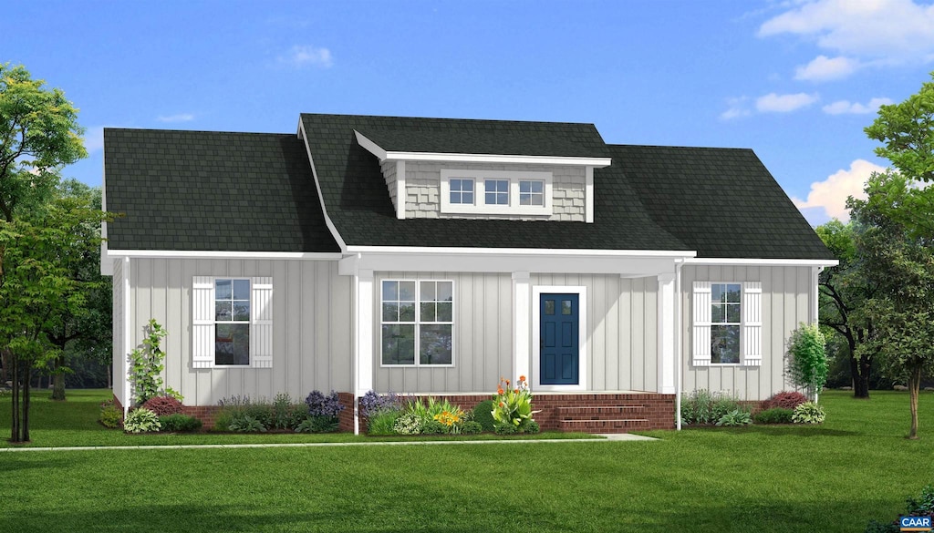 view of front of home with board and batten siding and a front yard