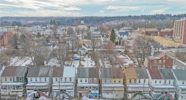 birds eye view of property with a residential view