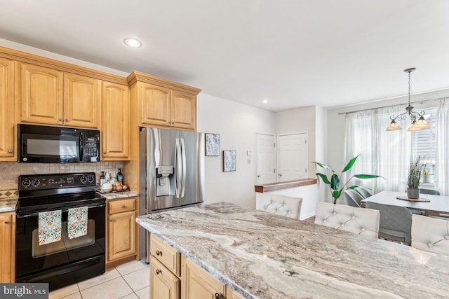 kitchen featuring black appliances, light stone counters, decorative backsplash, and light tile patterned flooring