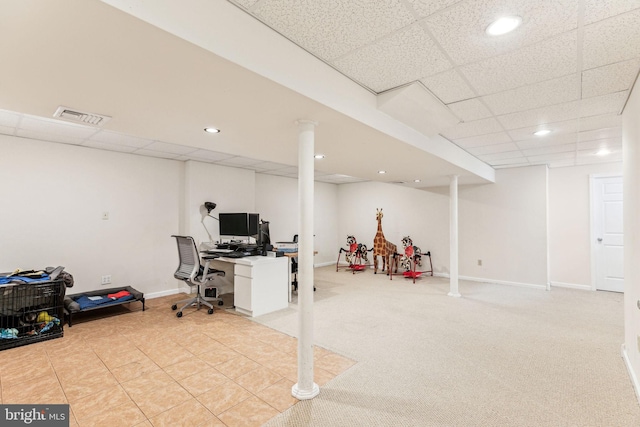 carpeted office space featuring a paneled ceiling, recessed lighting, visible vents, and baseboards