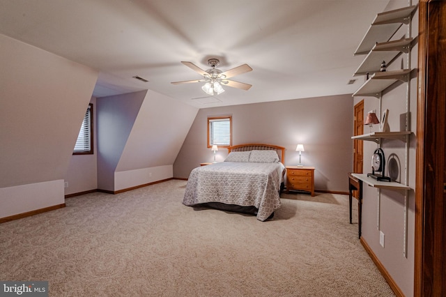 bedroom featuring lofted ceiling, light carpet, ceiling fan, and baseboards