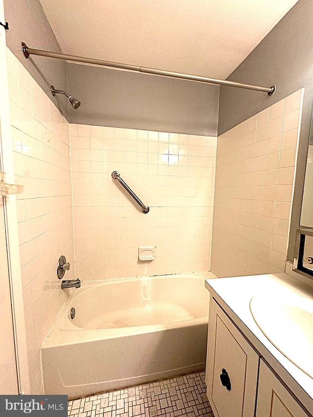 bathroom with vanity and shower / bathing tub combination