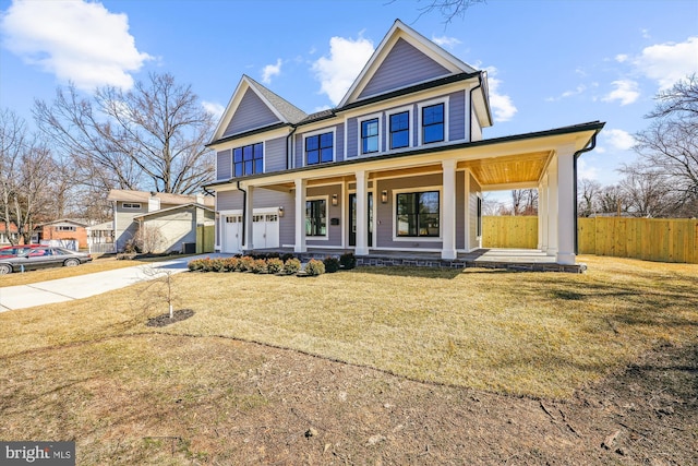 view of front facade featuring a front yard, fence, covered porch, concrete driveway, and a garage